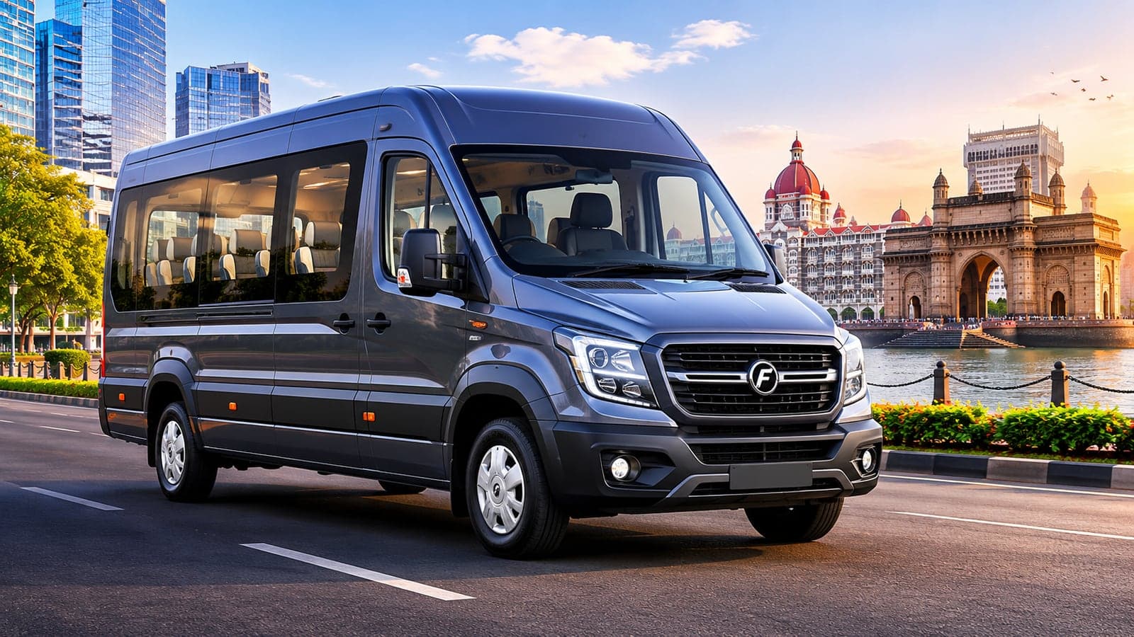 Grey Force Urbania passenger van on a waterfront road near the Gateway of India in Mumbai